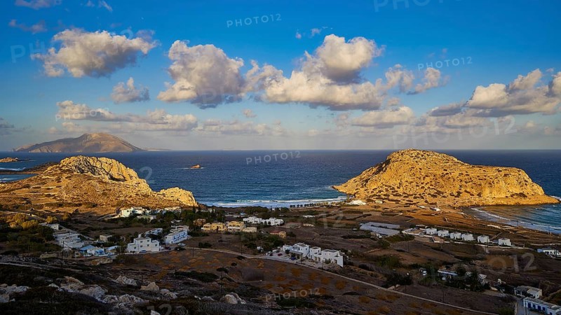 View of coastal village with white houses and rock formations in the background, Acropolis Hill, Arkasa, Kassos Island, West Coast, Karpathos, Dodecanese, Greek Islands, Greece, Europe