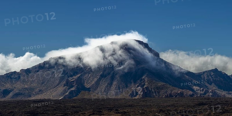 The summit of Montaña Guajara, also: Alto de Guajara, 2715m, crater walls, Caldera de las Cañadas, a huge volcanic cauldron, Teide National Park, Parque Nacional del Teide, at sunrise, Tenerife, Canary Islands, Spain, Europe