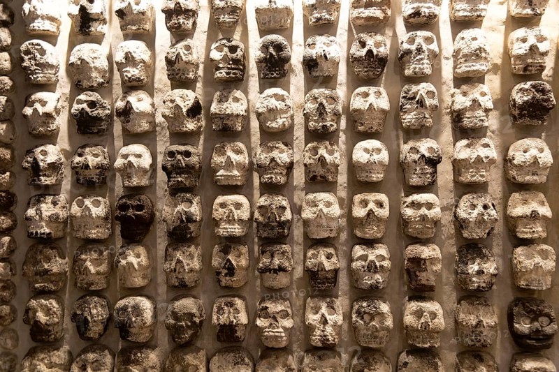Wall of stone human skulls, archaeological site and museum of Templo Mayor, Mexico City, Mexico, Central America