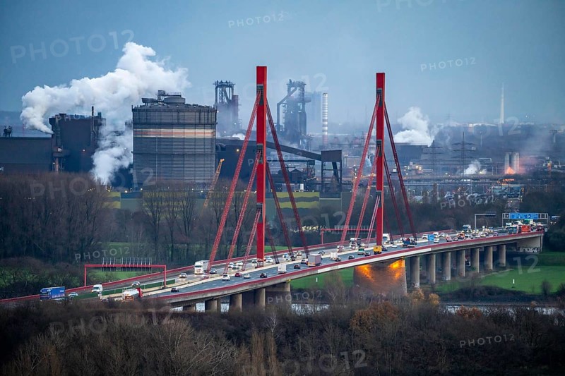 Thyssenkrupp Steel steelworks, blast furnaces 8 and 9, gasometer, motorway bridge of the A42 over the Rhine near Duisburg Beeckerwerth, Duisburg, North Rhine-Westphalia, Germany, Europe