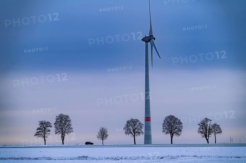 Wind farm, north of Lichtenau, self-proclaimed energy town, over 190 wind turbines and over 1200 solar panels generate 10 times as much electricity as the community of 11, 900 inhabitants consumes, largest onshore cluster of wind turbines in Germany, winter, slightly snow-covered landscape, North Rhine-Westphalia, Germany, Europe