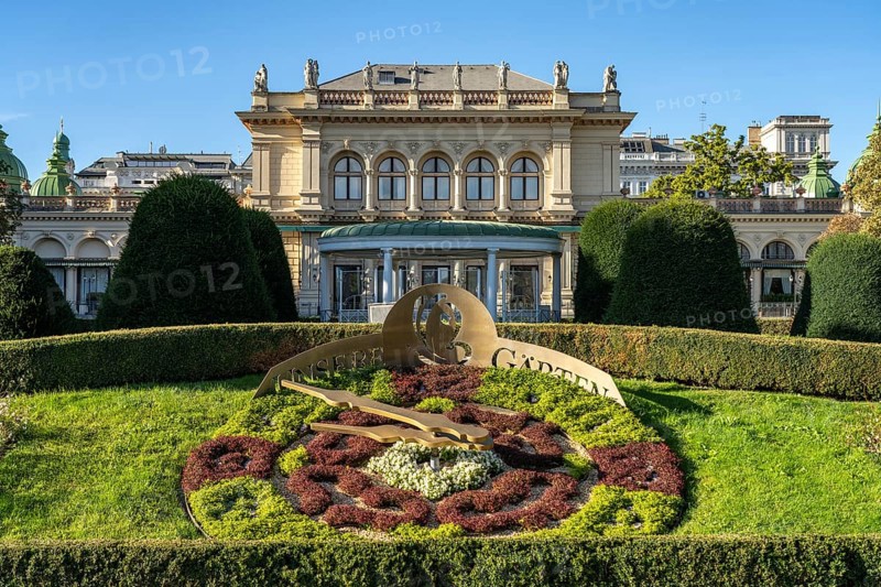 Flower clock and Kursalon Hübner in Vienna City Park, Vienna, Austria, Europe