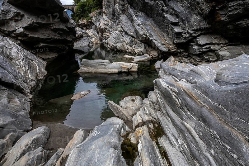 Rocks, granite rock formations in the Maggia River near Ponte Brolla, in the Maggia Valley, Valle Maggia, Canton Ticino, Switzerland, Europe
