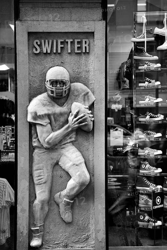 Rugby figure in a sports shop, New York City, USA, North America