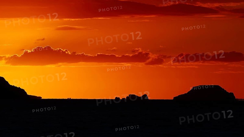 Tranquil island landscape at sunset, soft orange tones in the sky over the sea, sunset, Kassos, Karpathos, offshore islands, Dodecanese, Greek Islands, Greece, Europe