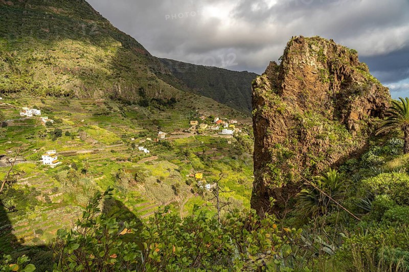 One of the twin rocks Roques de San Pedro, landmark of Hermigua, La Gomera, Canary Islands, Spain, Europe
