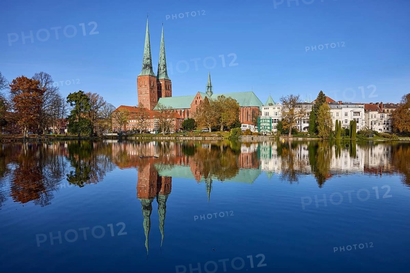 Mill pond with general buildings, Lübeck Cathedral and trees, symmetrical reflections on the water surface, Hanseatic city of Lübeck, Schleswig-Holstein, Germany, Europe