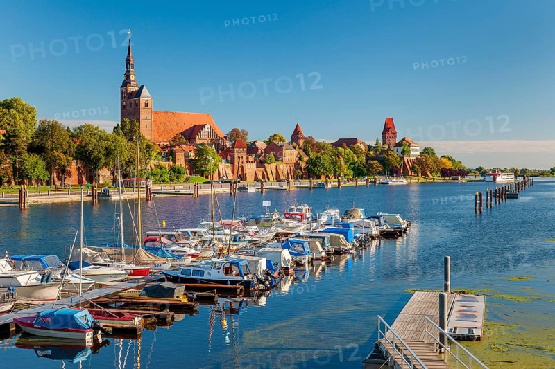 View over the Elbe harbour with boats to the old town with St. Stephen's church, town wall, castle and Elbe gate, brick architecture, Tangermünde, Altmark, Saxony-Anhalt, Germany, Europe