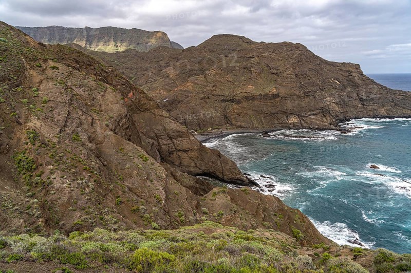The rocky coast and the beach Playa de la Caleta near Hermigua, La Gomera, Canary Islands, Spain, Europe