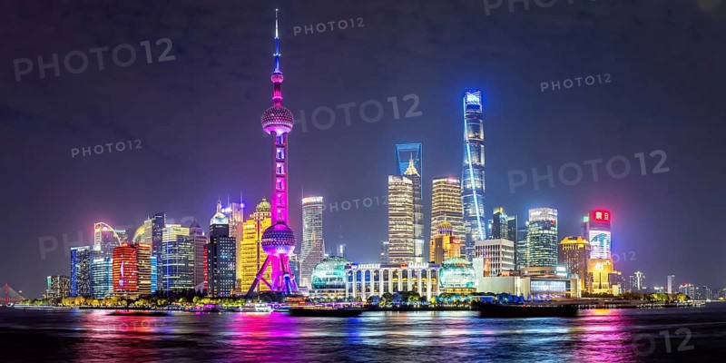 Shanghai skyline at the Bund with Oriental Pearl Tower city centre Downtown Pudong panorama at night in Shanghai, China, Asia