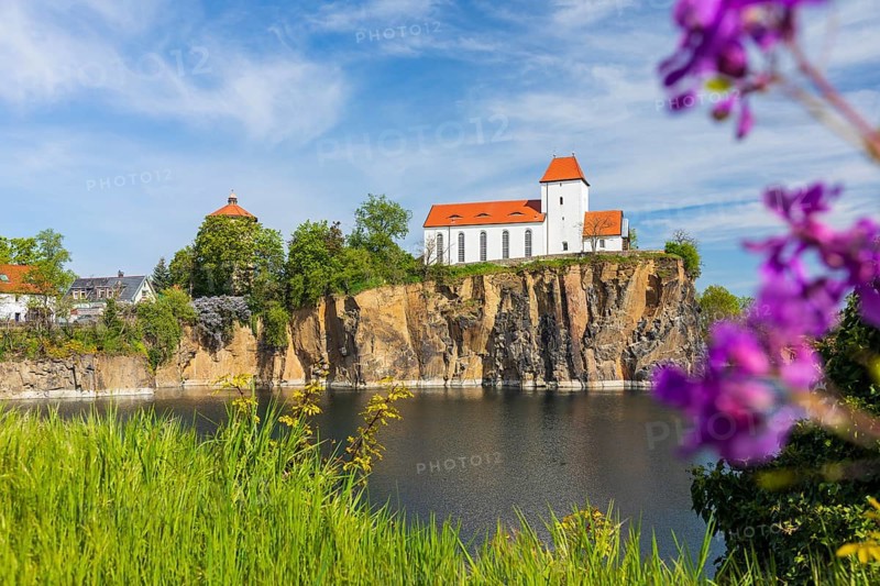 Mountain church and water tower on the Kirchberg, surrounded by the Kirchbruch quarry lake, striking view of Beucha, Brandis, Saxony, Germany, Europe