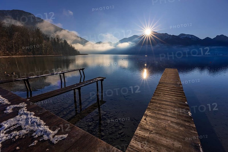 Jetty, boat dock, lake, reflection, fog, sunbeams, backlight, winter, snow, ice, Lake Kochel, view of Herzogstand, Heimgarten, Alpine foothills, Bavaria, Germany, Europe
