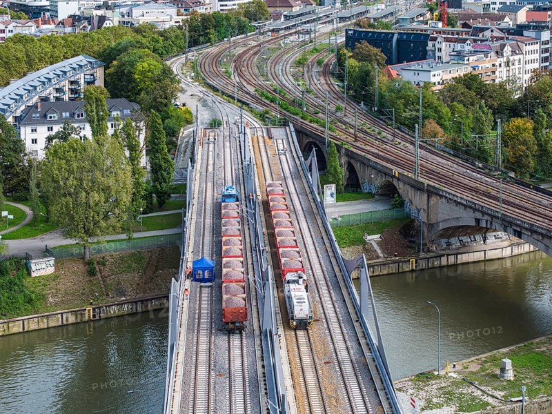 Load test on the Neckar Bridge, aerial view. Due to the unusual design, dimensional checks are mandatory in front of the bridge is opened to trains. Two goods trains with a combined weight of 960 tonnes load the 345-metre-long bridge over the Neckar. The bridge is part of the major Stuttgart 21 project. Stuttgart, Baden-Württemberg, Germany, Europe