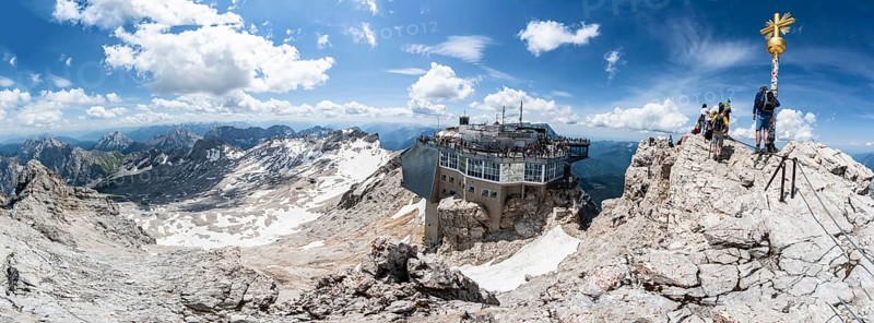 Panorama, view of the Zugspitzplatt, summit of the Zugspitze with golden summit cross and modern mountain station of the Bavarian Zugspitze railway at the summit of the Zugspitze, Wetterstein range, Northern Limestone Alps, Bavaria, Germany, Europe