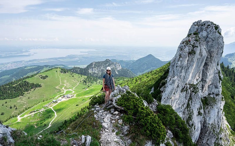 Climber with climbing rope on a climbing tour, climber on a mountain ridge, alpine climbing, crossing the Kampenwand, Chiemgau, Bavaria, Germany, Europe