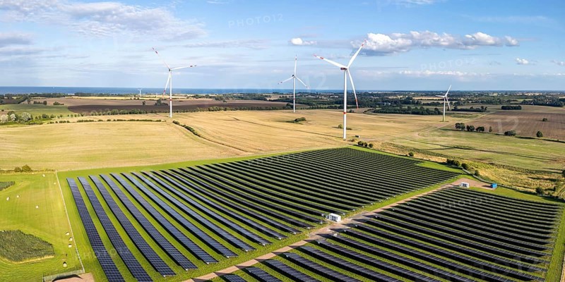 Wind farm and solar cells renewable energy wind power wind energy on the Baltic Sea aerial view near Heiligenhafen, Germany, Europe