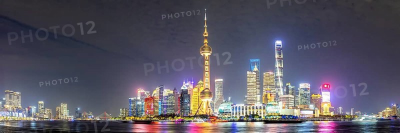 Shanghai skyline at the Bund with Oriental Pearl Tower city centre Downtown Pudong panorama at night in Shanghai, China, Asia