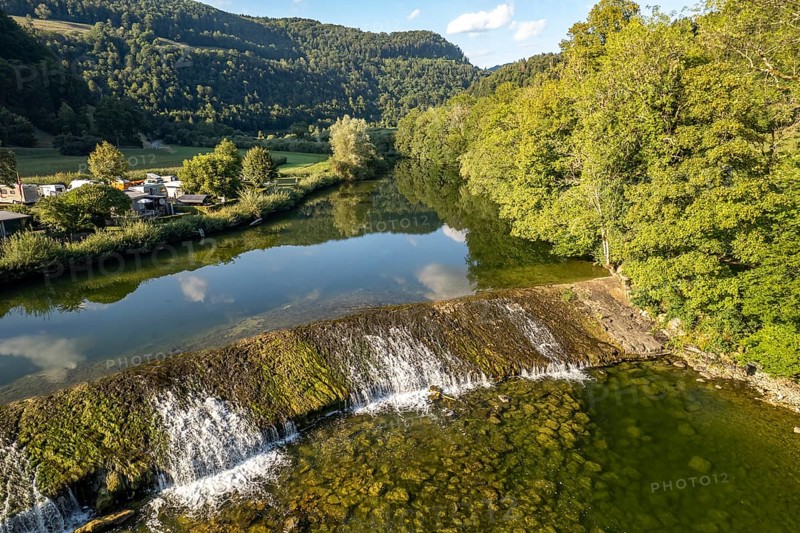 Camping site Moulin du Doubs and weir at the river Doubs near Ocourt seen from the air, Switzerland, Europe