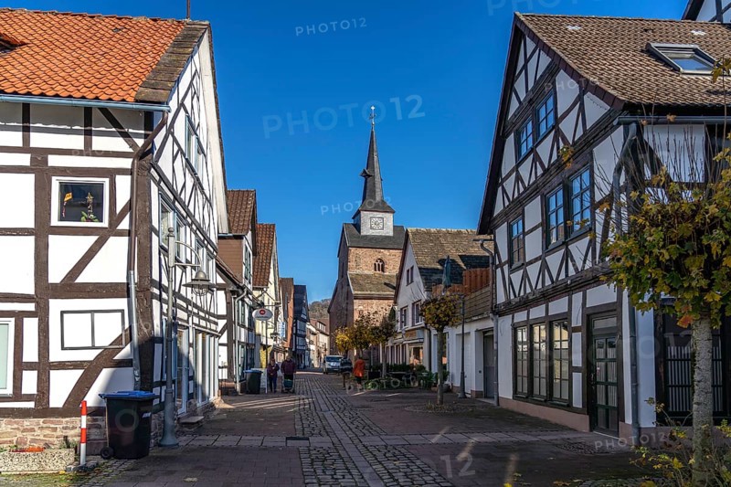 Half-timbered houses in the old town and the Protestant town church of St Nicolai in Bodenwerder, Lower Saxony, Germany, Europe