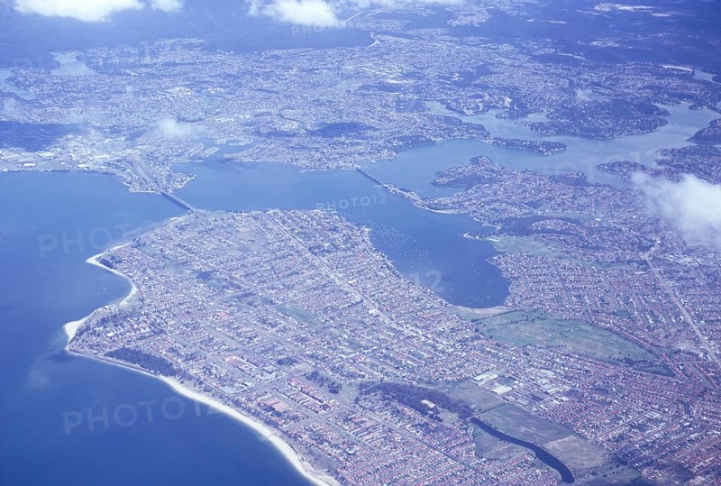 Oblique view of the suburban settlement of Georges River, Botany Bay, Sydney, Australia 1974 Captain Cook Bridge and Sans Souci