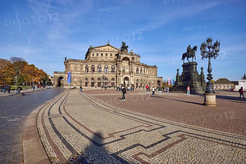 Semperoper, Opera House of the Dresden State Opera, architectural style Neo-Renaissance, architect Gottfried Semper, candelabra, equestrian statue of King John, pedestrians as accessories, square with mosaic of paving stones, theatre square, Dresden, state capital, independent city, Saxony, Germany, Europe