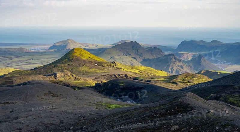 Volcanic mountain landscape overgrown with moss, atmospheric mountain landscape in the evening light, Pakgil, Iceland, Europe