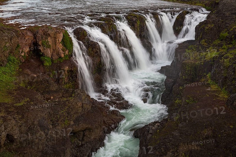 The Kolufossar waterfalls of the river Vididalsa consists of 3 falls the upper fall Efrifoss, in the middle Kolufoss and the lower fall Nedri-Kolufoss. Located in NW Iceland