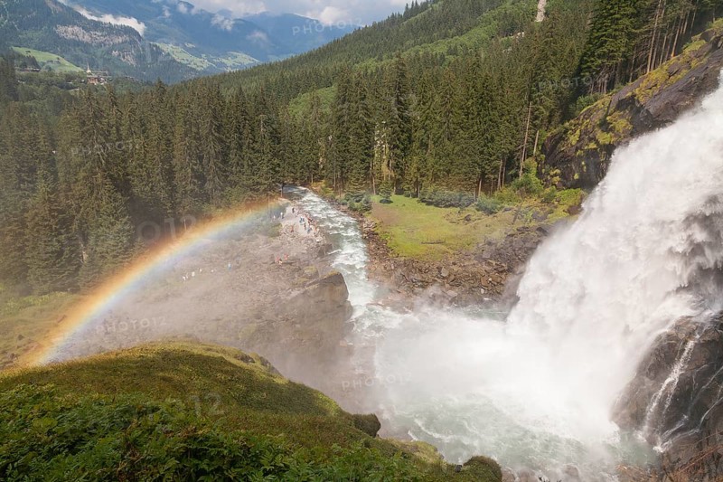 Krimml Waterfalls with rainbow. They have a total height of 380 metres (1, 247 feet) and are the highest waterfalls in Austria