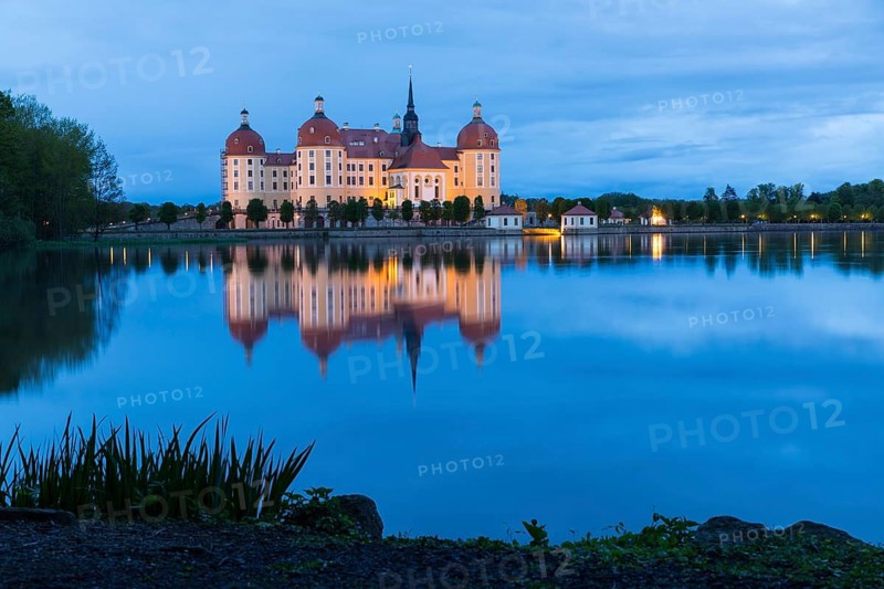 Moritzburg Hunting Lodge with reflection in the castle pond in the evening, Moritzburg, Saxony, Germany, Europe