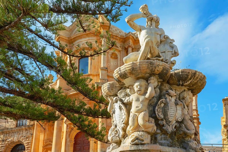 View of Hercules fountain and San Domenico church in the background, Noto Valley, Sicily, Italy, Europe