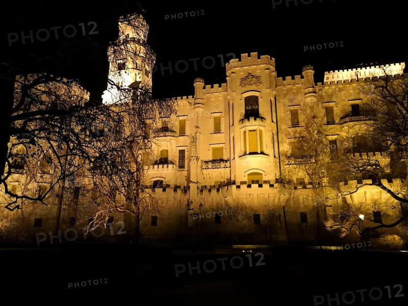 Illuminated castle at night. Hluboká is a historic château situated in Hluboká nad Vltavou. and is considered one of the most beautiful castles in the Czech Republic