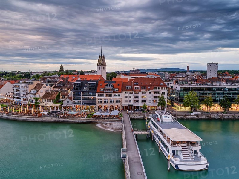 View from the Moleturm to the harbour of Friedrichshafen, ships, cloudy atmosphere at sunset, Lake Constance, Baden-Württemberg, Germany, Europe