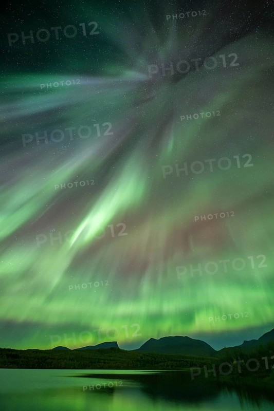 Northern Lights over the mountains of Lapporten, Abisko National Park, Lapland, Sweden, Europe