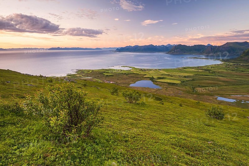 View of the coast and mountains from Mount Hoven, Gimsoy, Lofoten, Norway, Europe