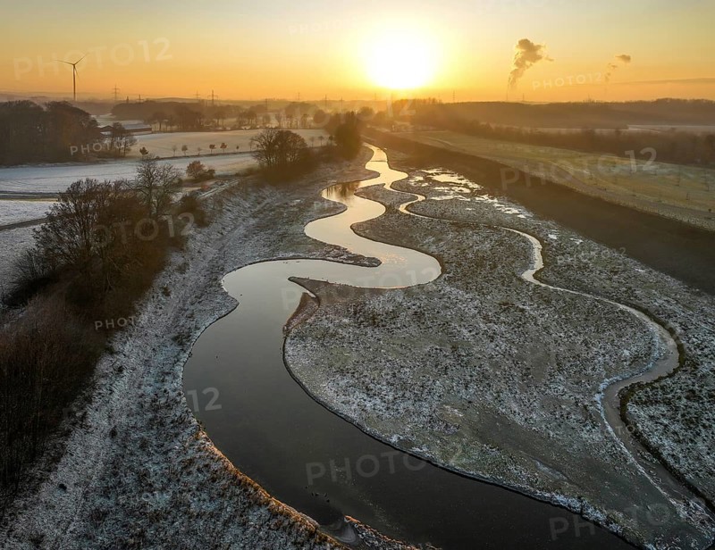 Recklinghausen, Castrop-Rauxel, North Rhine-Westphalia, Germany, winter landscape, EMSCHERLAND construction project, a 37-hectare water and nature discovery park at the water crossroads of the Rhine-Herne Canal and the renaturalised Emscher on the city limits of Recklinghausen and Castrop-Rauxel. The ecological focal point at the confluence of the Suderwicher Bach (right) and Emscher (left) will also be a future garden for the International Garden Exhibition 2027. Before the renaturalisation, the Emscher river system was an open, above-ground wastewater channel, combined sewer with surface water and wastewater, Europe