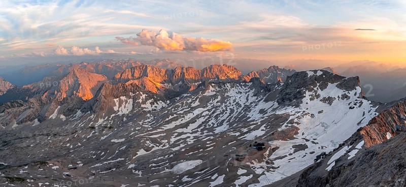 View of mountain panorama from the summit of the Zugspitze, Zugspitzplatt and Mieminger Kette, alpenglow at sunset, Northern Limestone Alps, Wetterstein Mountains, Bavaria, Germany, Europe