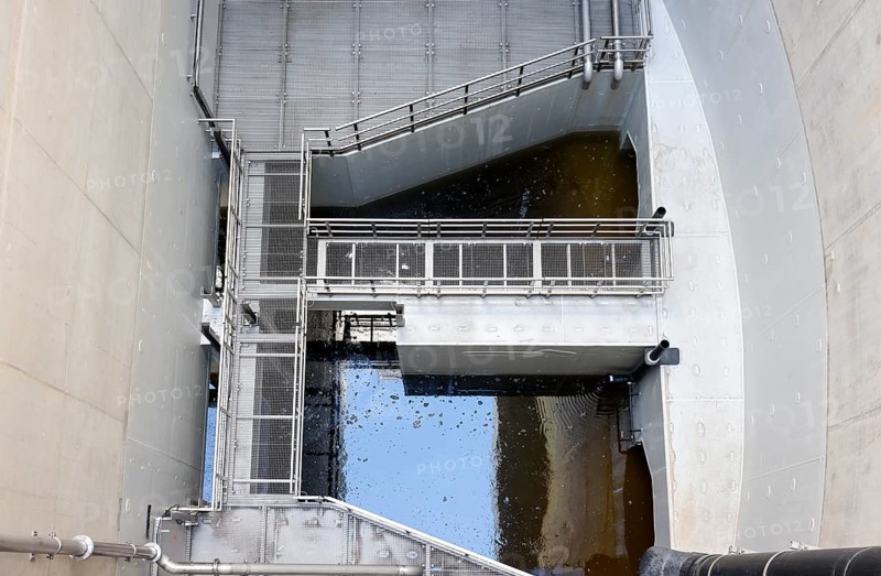 Oberhausen, Ruhr area, North Rhine-Westphalia, Germany - Emscher conversion, new Emscher AKE sewer, here the inlet channel from the Oberhausen pumping station, test run, the pumping station is being flooded on a trial basis, the pumps are also being tested, which will pump 16, 000 litres of wastewater per minute in future, the ecological conversion of the Emscher system consists of the construction of a central wastewater treatment system in the Ruhr area, the construction of sewers and the renaturation of the Emscher and its tributaries
