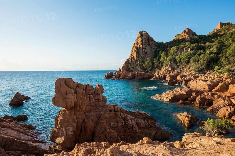 Red rocks and sea, Spiaggia Su Sirboni, sunrise, near Tertenia, Province of Ogliastra, Sardinia, Italy, Europe