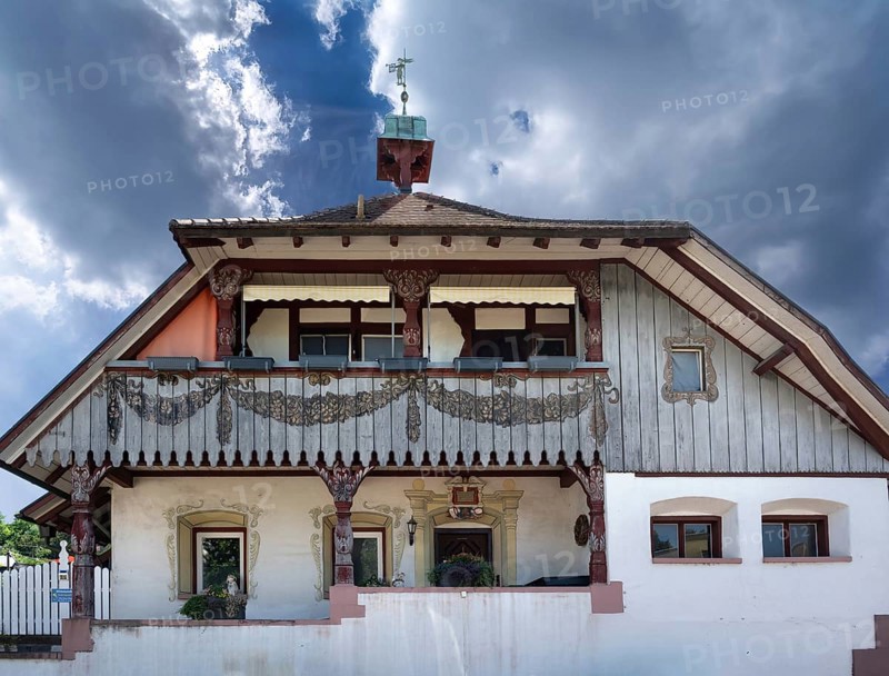 Former historic farmhouse with midday chimes, Riegel am Kaiserstuhl, Baden-Württembnerg, Germany, Europe