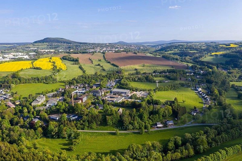 Aerial view with Pöhlberg and mountain town Annaberg-Buchholz, in the background the Bärenstein, Keilberg and Fichtelberg, in the foreground the industrial area of Wiesa, Thermalbad Wiesenbad, Erzgebirge, Saxony, Germany, Europe