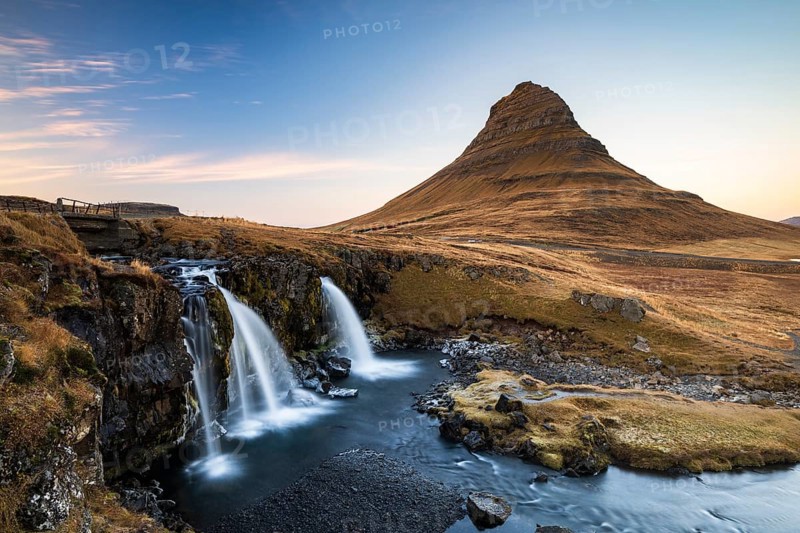 Kirkjufell mountain with Kirkjufellfoss waterfall, cloudy mood, Grundarfjördur, Snäfellsnes peninsula, Snæfellsnes, West Iceland, Iceland, Europe