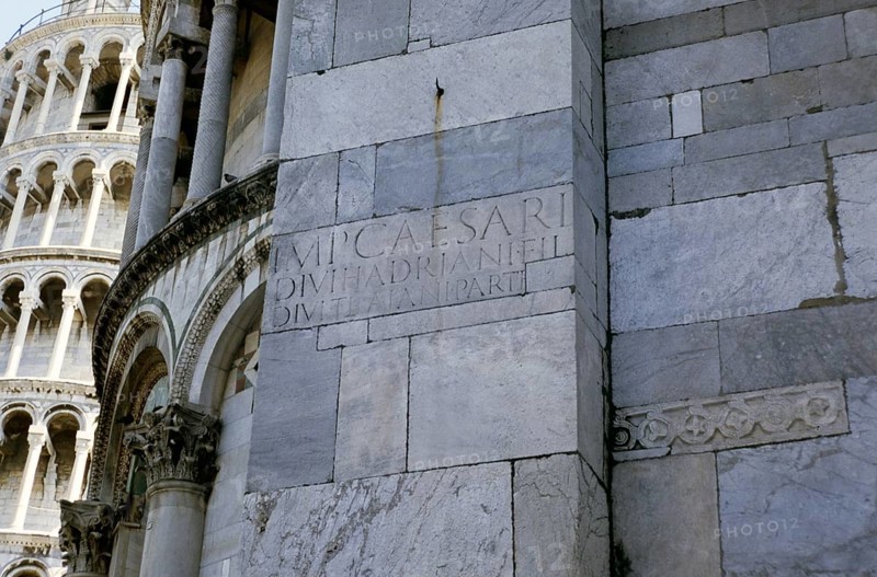 Ancient Roman stones with Latin inscription in honour of Caesar Hadrian during the construction of the cathedral in Pisa, Italy, 1999, Europe