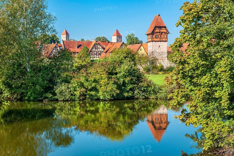 View of the old town with half-timbered houses, towers and town wall, on the right the Bäuerlinsturm, reflection in the river Wörnitz, Romantic Road, Dinkelsbühl, Middle Franconia, Franconia, Bavaria, Germany, Europe