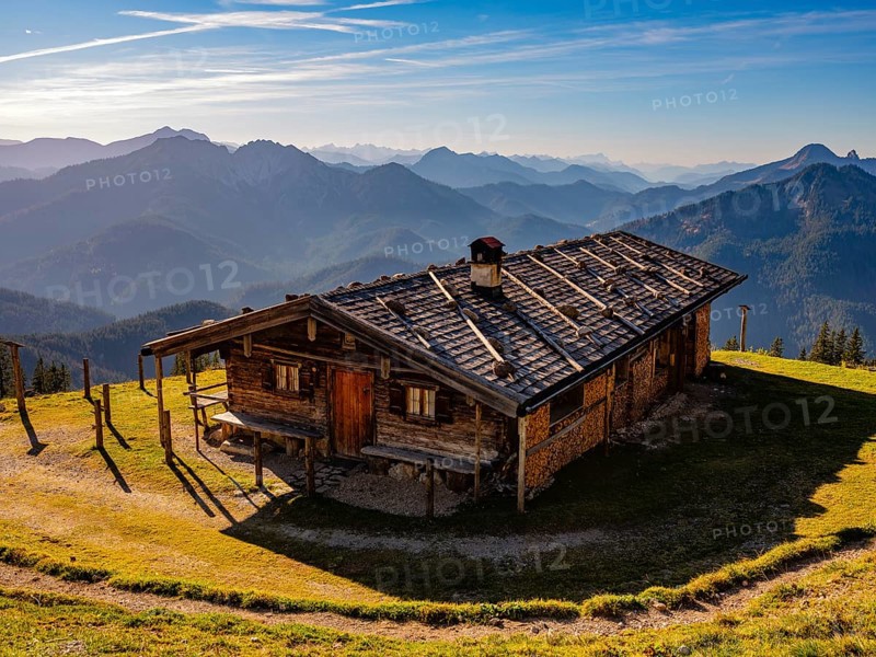 Wildfeldalm in front of alpine panorama, silhouette of mountain ranges, Mangfall mountains, Spitzingsee, Upper Bavaria, Bavaria, Germany, Europe