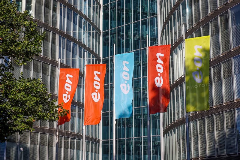 Essen, North Rhine-Westphalia, Germany, E.ON headquarters. e.on company logos on flags in front of the headquarters, Europe
