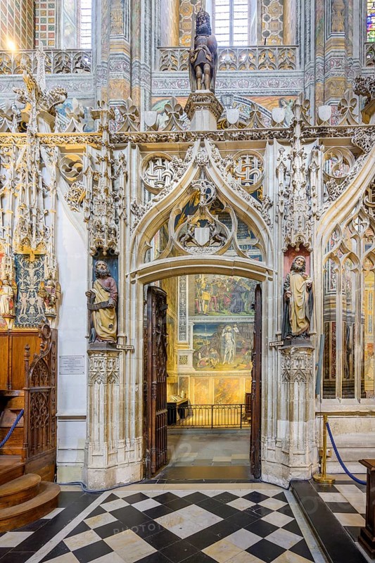 Exit portal from the choir flanked by statues of St Simon and St Mathias in St Cecilia's Cathedral, Albi, Tarn department, France, Europe