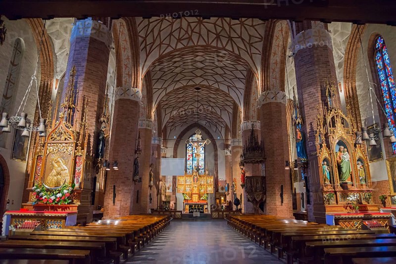 Impressive nave with vaulted ceiling and rows of wooden benches, St Jakobi Church, Olsztyn, Allenstein, Warmia-Masuria, Poland, Europe