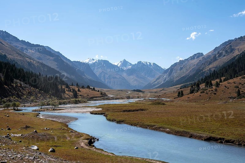 Mountain river in a picturesque mountain valley, mountain landscape with white mountain peaks, Tian Shan Mountains, Issyk-Kul, Kyrgyzstan, Asia
