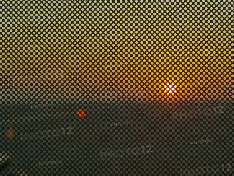 Berlin BER Airport, view through perforated window panes, taxiway at sunrise in November, Berlin, Germany, Europe