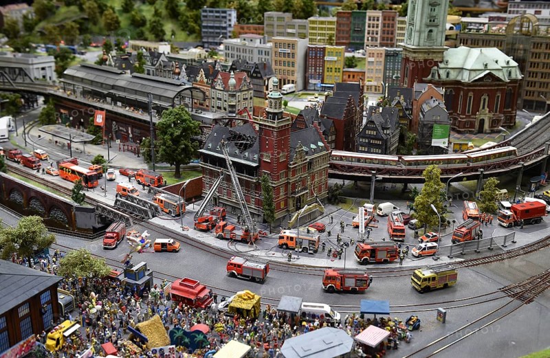 Fire brigade extinguishes burning house at Miniatur Wunderland Hamburg, Germany, Europe
